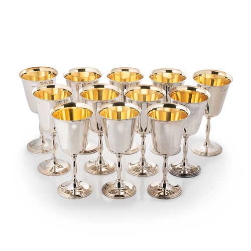 Lot 576 - A set of 12 Elizabeth II silver goblets