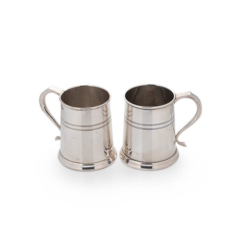 Lot 575 - A pair of Elizabeth II silver beer mugs