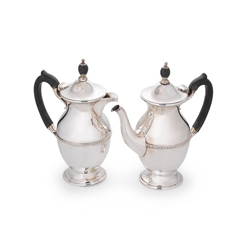 Lot 544 - A George V silver two-piece café au lait set