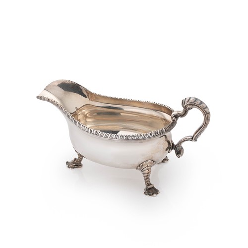 Lot 478 - A George II silver sauce boat