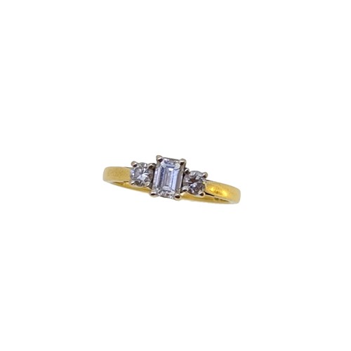 Lot 93 - An 18ct gold three stone diamond ring