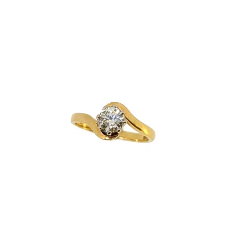 Lot 250 - An 18ct gold diamond single stone cross over ring