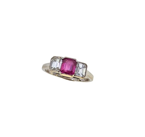 Lot 145 - A ruby and diamond three stone ring