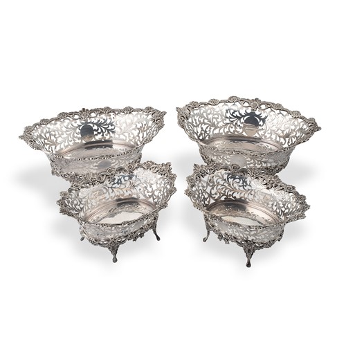 Lot 529 - A harlequin set of four Edward VII silver bon bon dishes