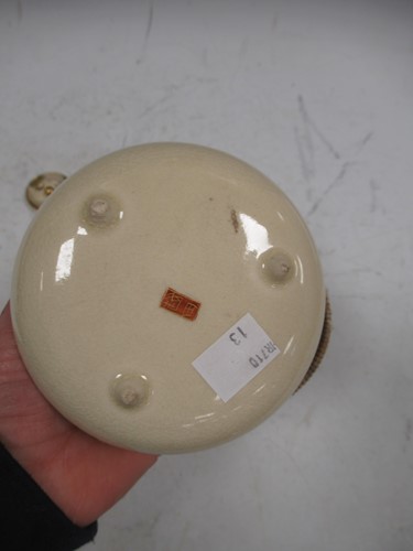 Lot 72 - A Satsuma pottery small teapot and cover,...