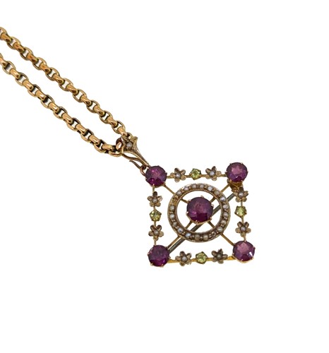 Lot 36 - An early 20th century multi stone pendant and chain