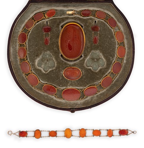 Lot 288 - A 19th century cornelian intaglio cased parure