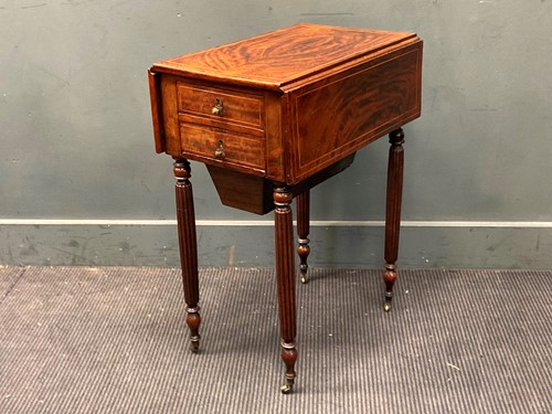 Lot 774 - A 19th century line inlaid mahogany work table...