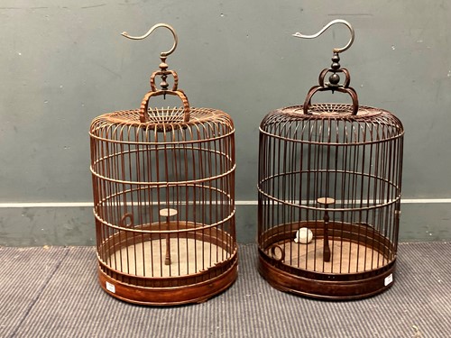 Lot 857 - A pair of eastern bent wood bird cages, approx...