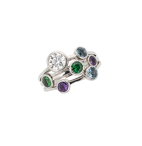 Lot 86 - A diamond, aquamarine, tsavorite garnet and amethyst scatter ring