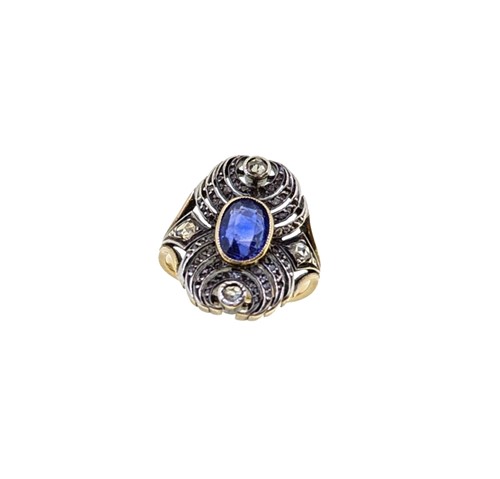 Lot 121 - An early 20th century sapphire and diamond panel style ring