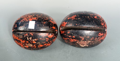 Lot 23 - A pair of Japanese carved and red lacquered Zen temple bells, Mokuygo, late Meiji Period