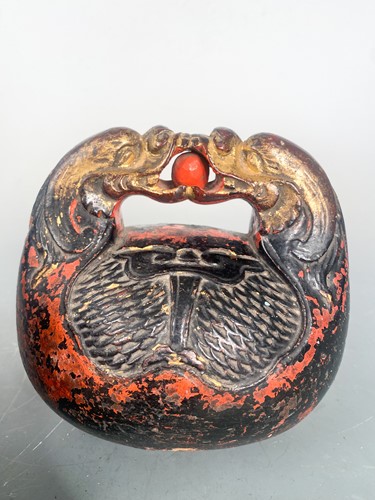 Lot 23 - A pair of Japanese carved and red lacquered Zen temple bells, Mokuygo, late Meiji Period