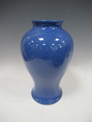 Lot 28 - A Moorcroft powder blue vase, 32cm high