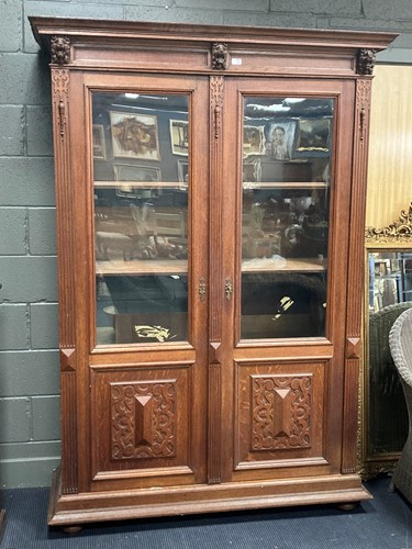 Lot 885 - A Dutch oak cupboard by Pander, circa 1900,...