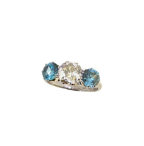 Lot 285 - A diamond and zircon three stone ring