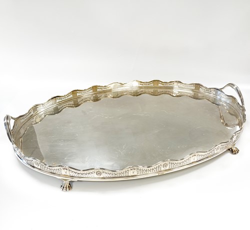 Lot 634 - A George V silver gallery tray