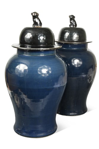 Lot 30 - A pair of Chinese porcelain monochrome blue/black glazed baluster vases and covers, 20th century