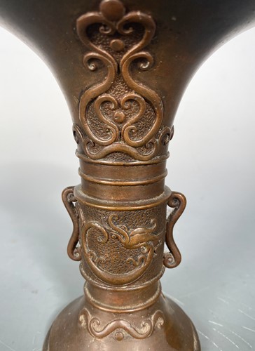 Lot 17 - A Chinese bronze Gu vase, circa 1900