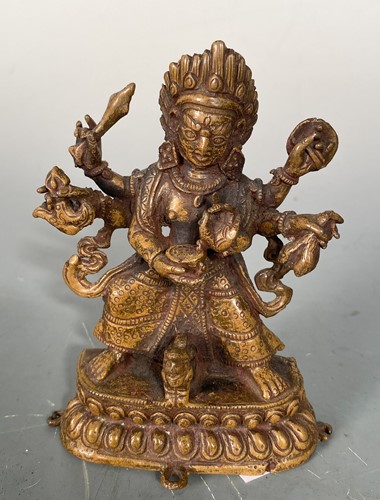 Lot 26 - A Tibetan bronze figure of six-armed Mahakala, 19th/20th century