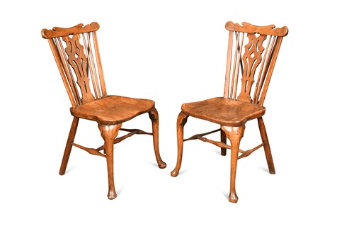 Lot 493 - A pair of Thames Valley cherry and elm comb-back side chairs, circa 1790