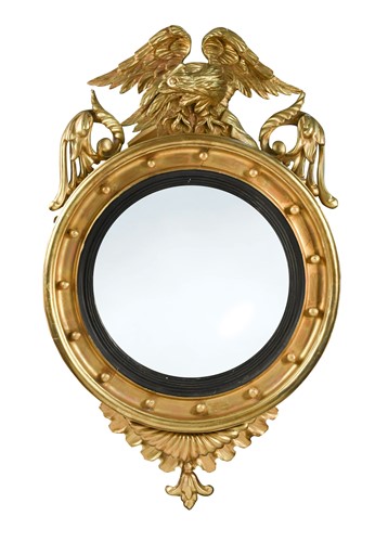 Lot 583 - A Regency convex wall mirror