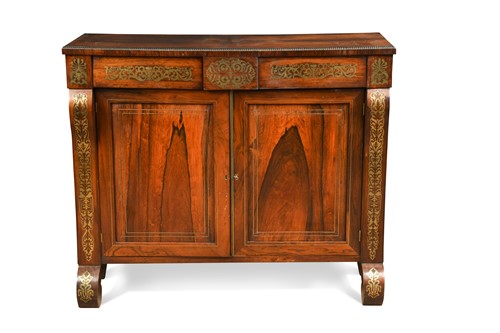 Lot 670 - A Regency brass inlaid rosewood side cabinet