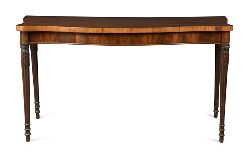 Lot 787 - A George III mahogany serpentine serving table