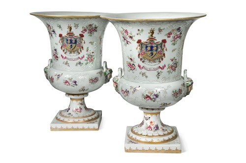 Lot 44 - A pair of Sampson two-handled armorial urns