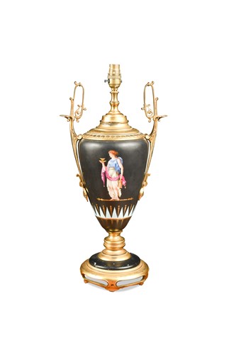 Lot 149 - A gilt metal mounted Continental porcelain table lamp, late 19th century