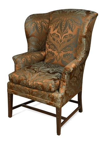 Lot 610 - A George III mahogany wing back armchair