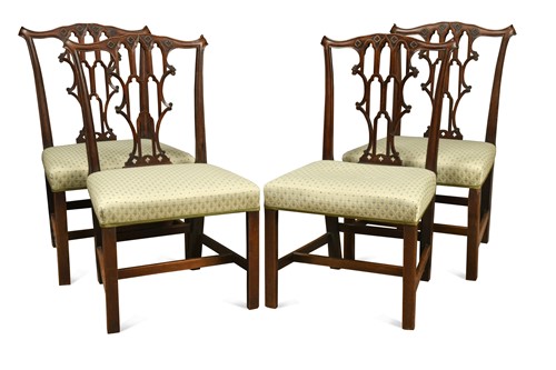 Lot 574 - A set of four George III mahogany dining chairs