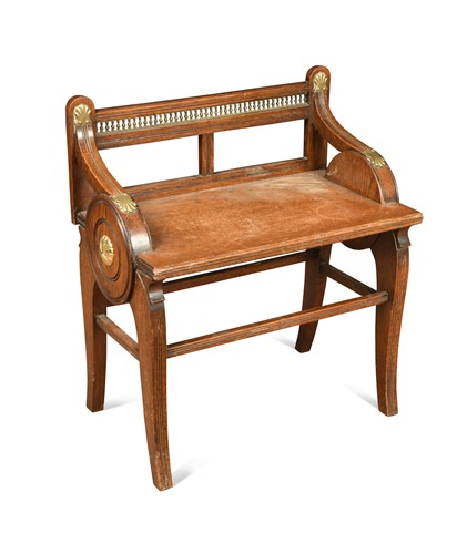 Lot 822 - An oak and brass mounted stool in the manner of Jas. Shoolbred, circa 1900