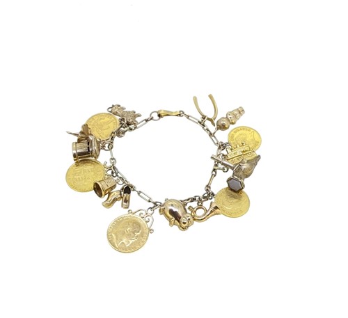 Lot 24 - A charm bracelet