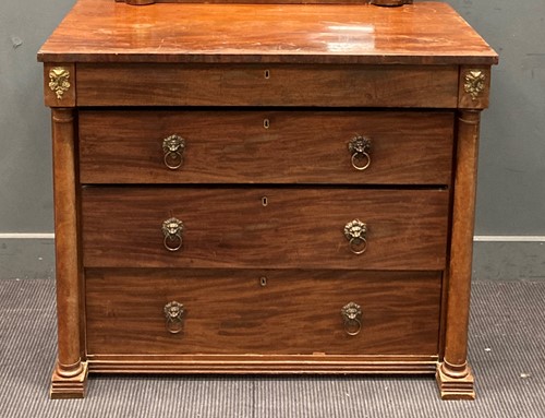 Lot 868 - A Continental mahogany chest of four drawers, 19th century