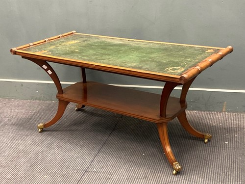 Lot 687 - A leather top mahogany low table in the...