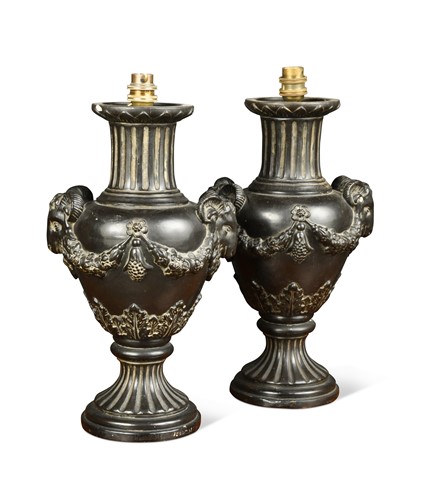 Lot 734 - A pair of black basalt vase lamps