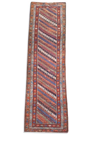 Lot 497 - A Kurdish runner rug, circa 1930