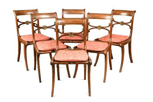 Lot 640 - A set of nine Regency faux-rosewood dining chairs