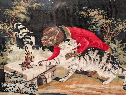 Lot 536 - A needlework picture of a monkey and cat