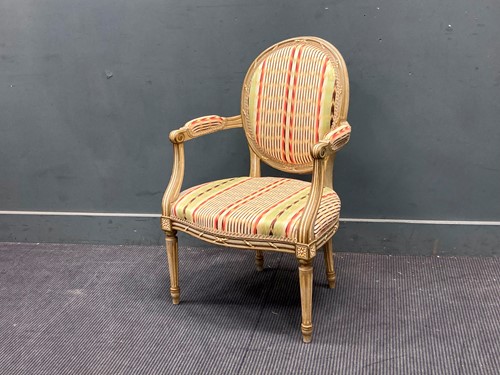Lot 850 - A Louis XVI style painted armchair, teh...