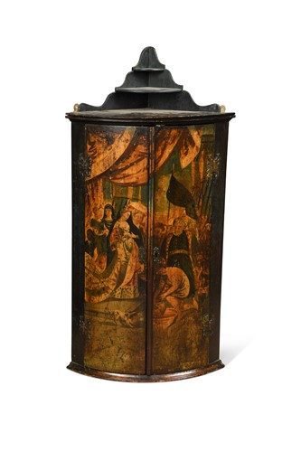 Lot 660 - A George III painted and black lacquered bow front corner cupboard