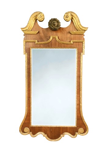 Lot 564 - A George II mahogany and parcel gilt wall mirror