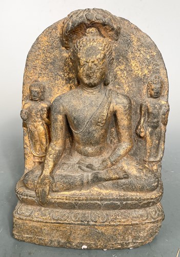 Lot 116 - A Nepalese carved and gilded stone figure of Buddha