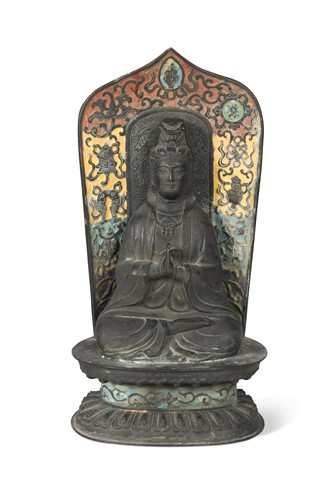 Lot 19 - A Chinese champleve enamel decorated Guanyin,  Qing Dynasty 18/19th century