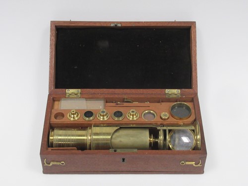 Lot 107 - A Victorian brass field microscope in original...