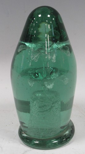 Lot 100 - A Victorian green glass dump paper weight with...