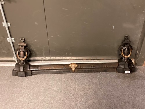 Lot 912 - An Edwardian black painted cast iron and brass...