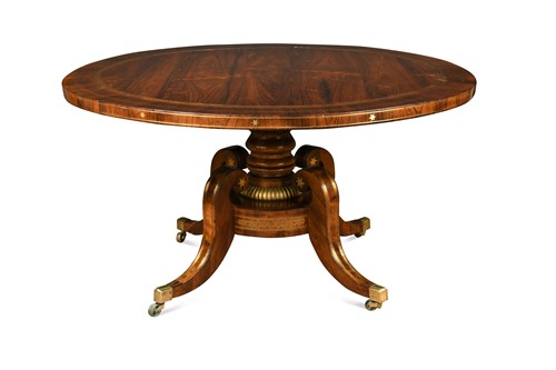Lot 669 - A Regency rosewood and brass inlaid centre table
