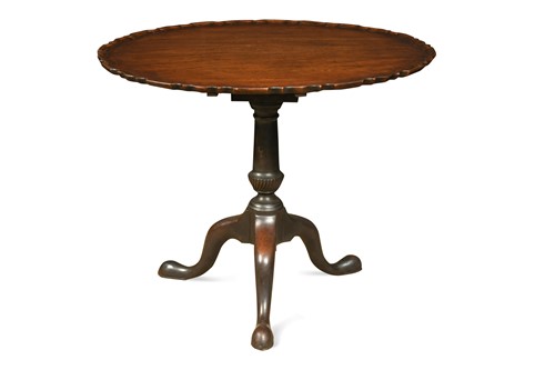 Lot 508 - A George III mahogany pie-crust occasional table